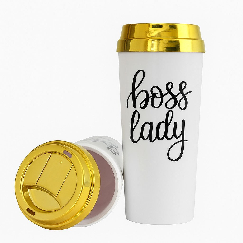 White travel mug with 'boss lady' text and gold lid on a white background