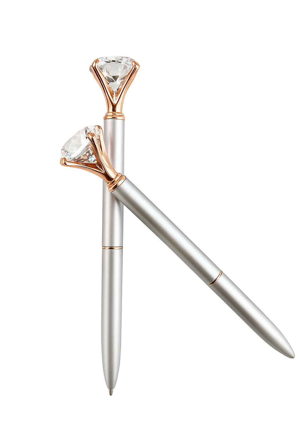 Brushed silver ballpoint pen with rose gold accents and clear gemstones on a white background