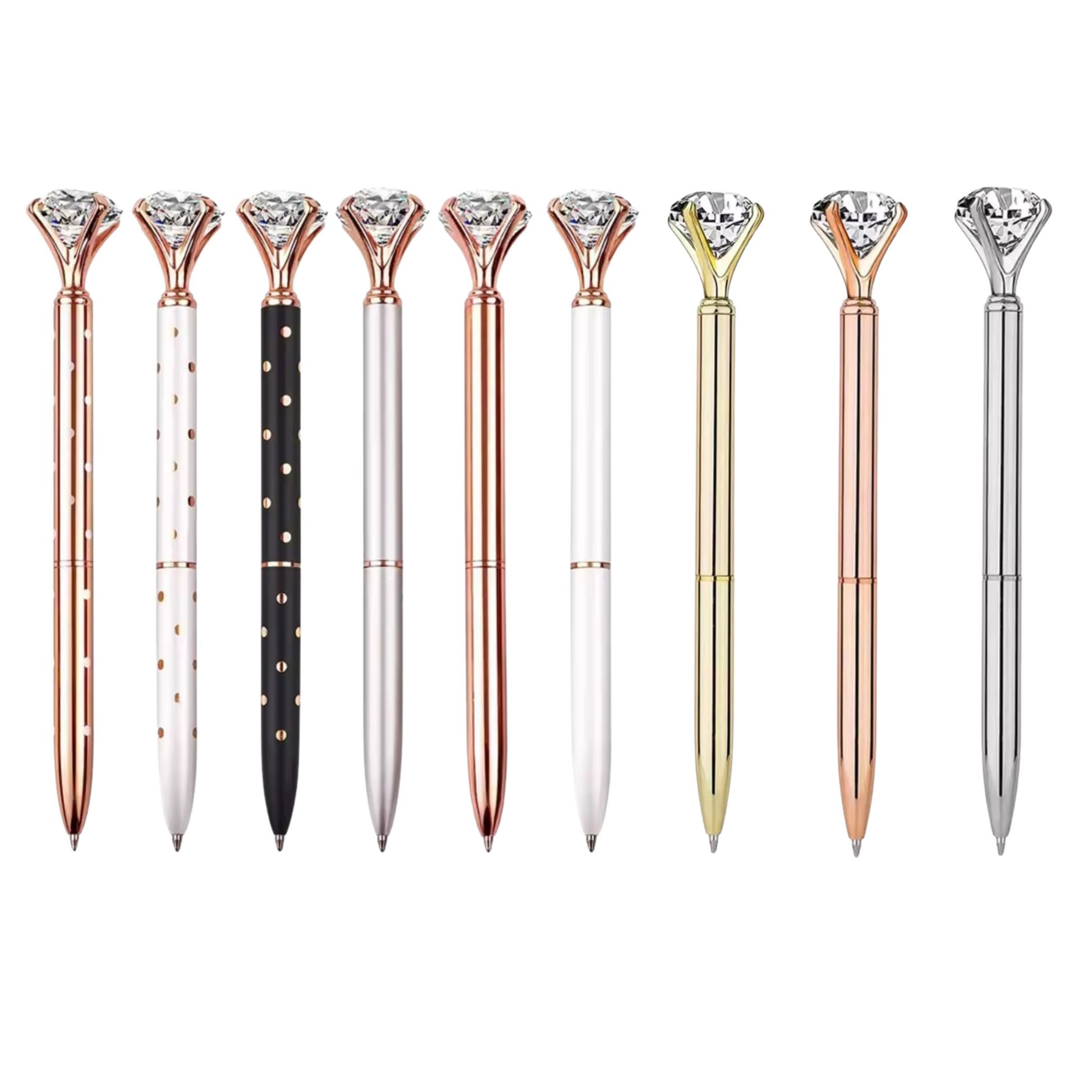 Ballpoint pens with diamond-shaped tops arranged side by side on a white background. Designs include rose gold, gold, silver, black with gold polka dots, white with rose gold polka dots, and solid white and metallic finishes.